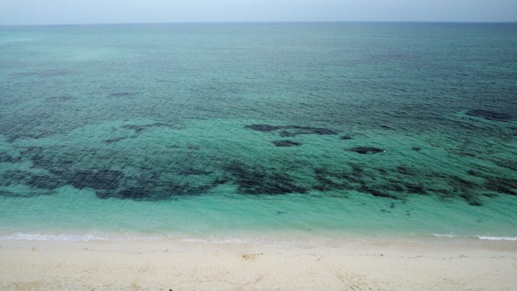 Beautiful waters of the Caribbean in Freeport, Grand Bahamas using drone footage.