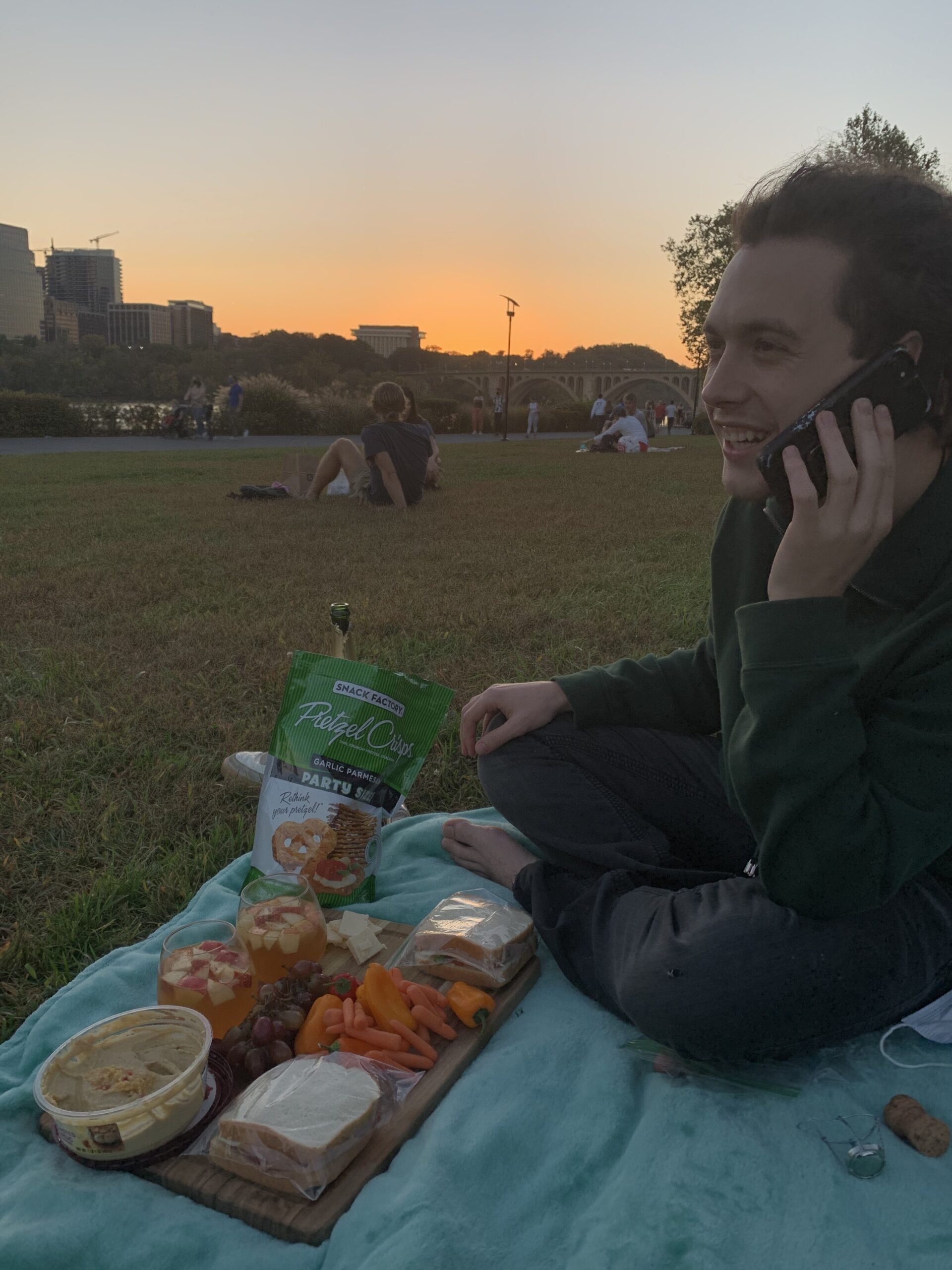 Dylan and I enjoying a picnic on the Georgetown lawn at sunset