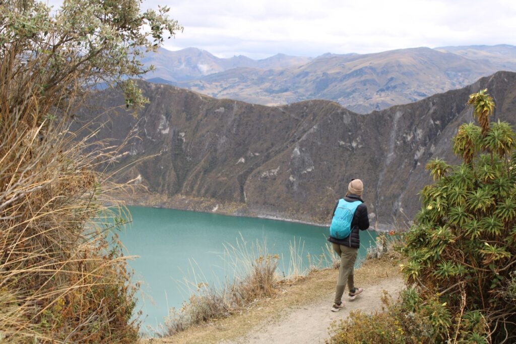 Sam hiking around Quilotoa, one of the best places to hike around Quito!